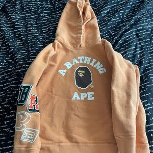A Bathing Ape Orange Graphic sweatsuit